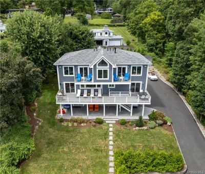 hundreds of square feet of decking and patio | Image 2