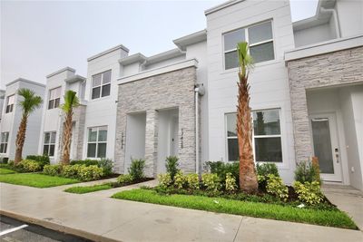 17428 Hidden Forest Drive, Townhouse with 4 bedrooms, 3 bathrooms and null parking in Clermont FL | Image 1