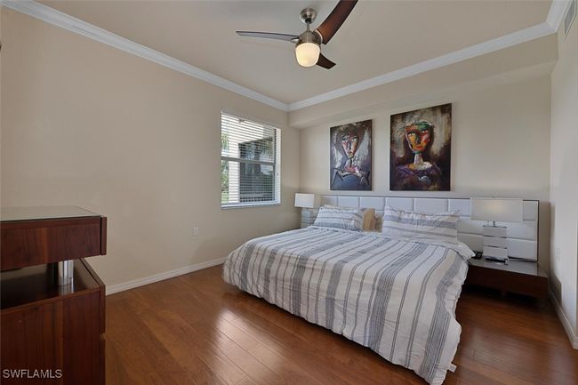 Primary suite with Cherry Laminate flooring | Image 10