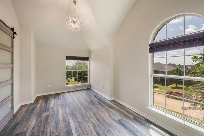 Bedroom #5 with barn door that leads to bathroom #3 | Image 32