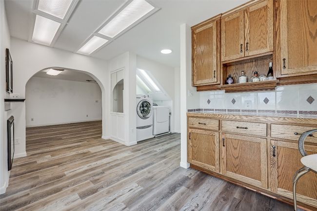 Generous Cabinet Space off of the Dining area provides space for serving and a wine bar. | Image 15