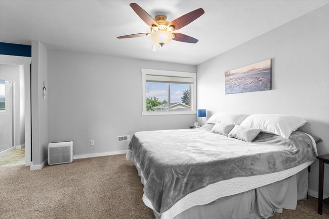 2nd floor Primary Bedroom featuring carpet flooring and ceiling fan | Image 17