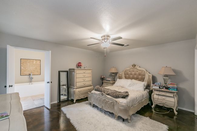 Unit 4904 Primary Bedroom with ceiling fan | Image 32