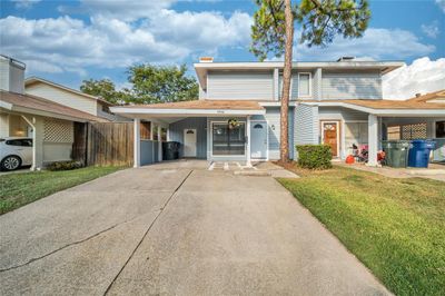 View of front facade featuring a carport and a front yard | Image 2