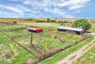 Large barn, shed, pens and additional equipment shed in the distance. | Image 2