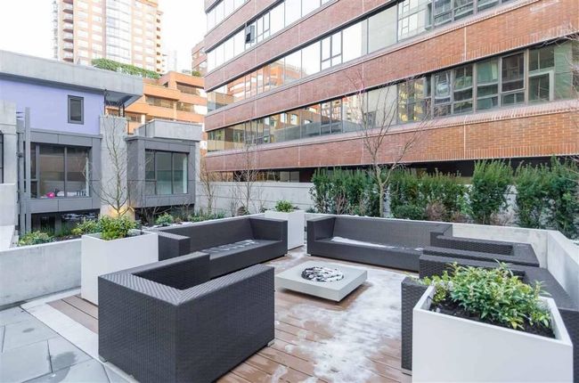 View of patio / terrace with an outdoor living space with a fire pit | Image 10