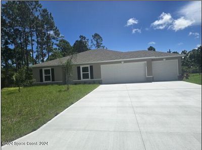 1068 Tide Road Se, House other with 3 bedrooms, 2 bathrooms and null parking in Palm Bay FL | Image 1