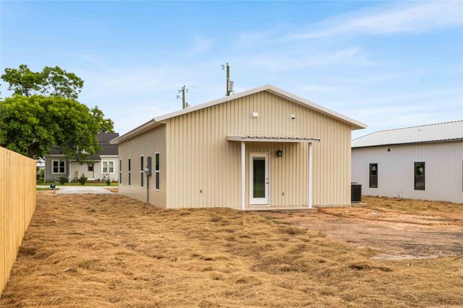 Back of property featuring central AC unit | Image 32