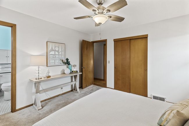 View of closet and door out to the main hallway | Image 17