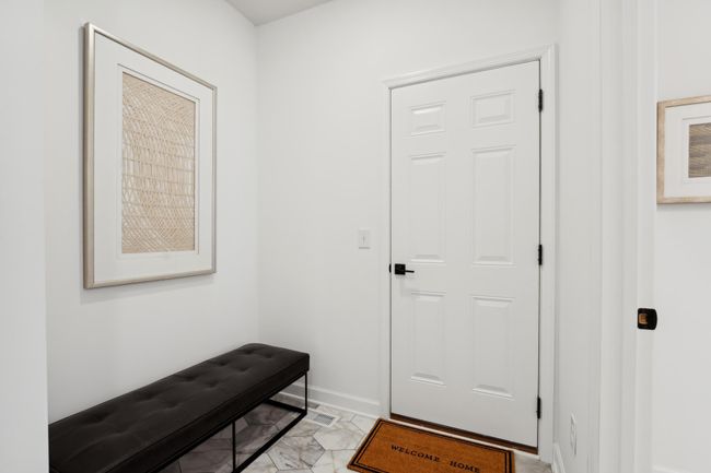 (Photo of a decorated model, actual homes finishes will vary) Upper level laundry. | Image 18