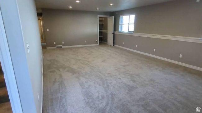 Carpeted empty room featuring recessed lighting and baseboards | Image 47