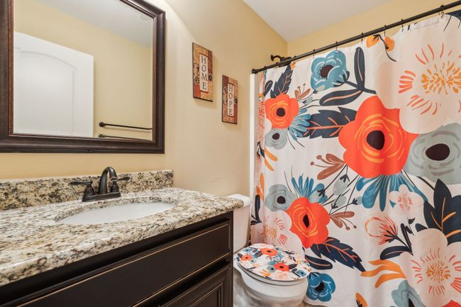 The third full bathroom has a single vanity and combo shower/tub. 1107 Sycamore Leaf Way Murfreesboro, TN 37129 | Image 28