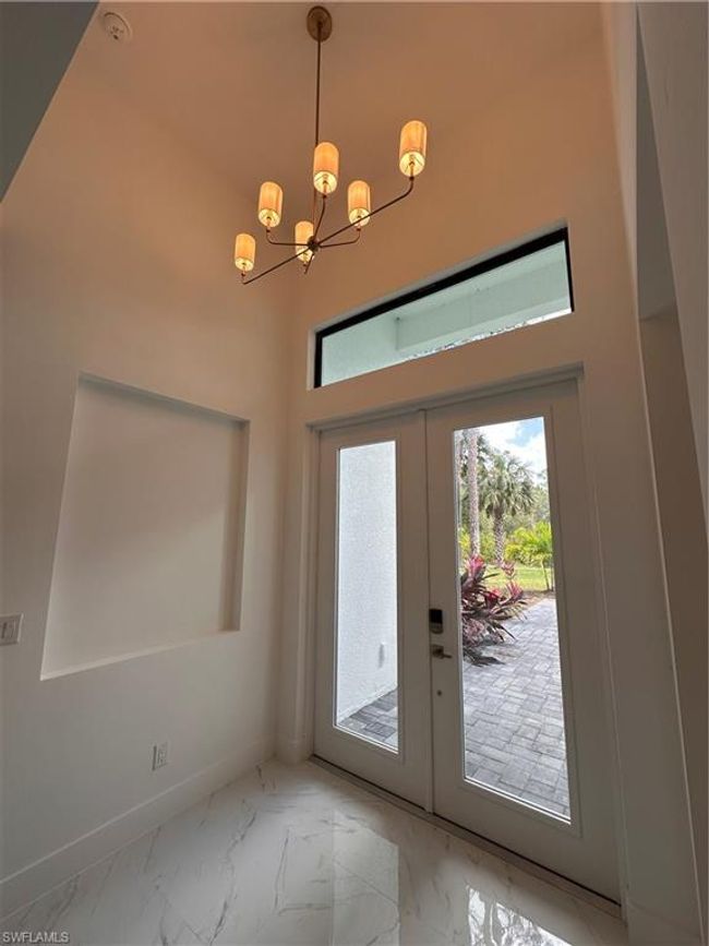491 9 Th St Sw, House other with 4 bedrooms, 3 bathrooms and 3 parking in Naples FL | Image 6