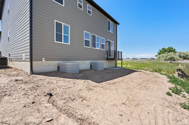 View of home's exterior with central AC unit | Image 49