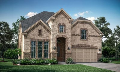 French country home with a front yard and a garage | Image 1