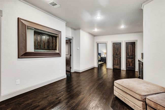 The bonus room leads to two guest bedrooms, both with private baths, plus lots of storage closets! | Image 27