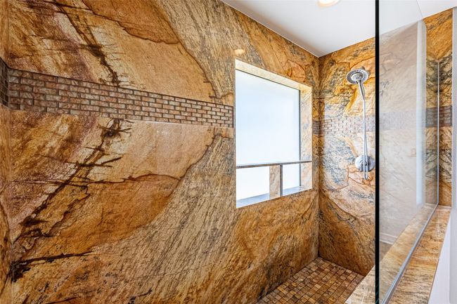 Bathroom with a tile shower | Image 11