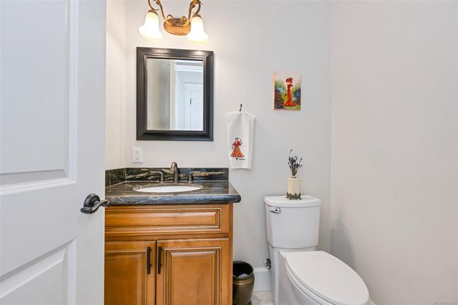 Half bath featuring toilet and vanity | Image 77
