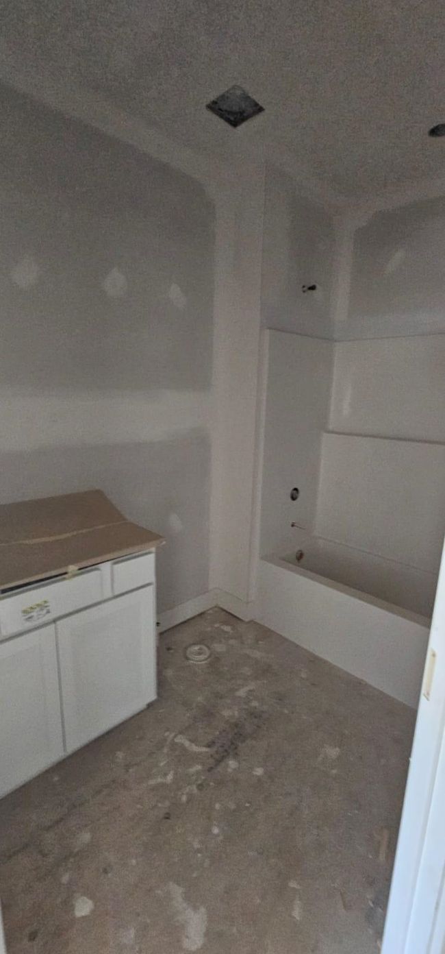 Full bath with washtub / shower combination and vanity | Image 5