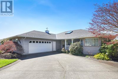 1313 Farquharson Dr, House other with 5 bedrooms, 5 bathrooms and 2 parking in Courtenay BC | Image 2