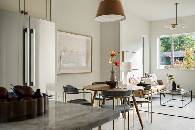 Dining room featuring a chandelier and light wood-type flooring | Image 5