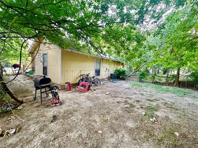 View of yard with central air condition unit | Image 18