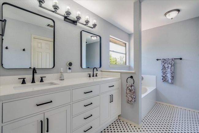 Primary bathroom has been newly renovated with cabinets, quartz counters, fixtures & hardware. | Image 20