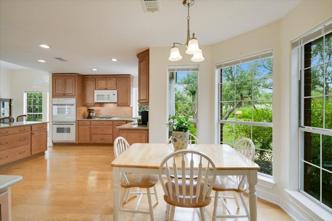 Solid ash, soft-close cabinets offer both style and durability for everyday use. | Image 8