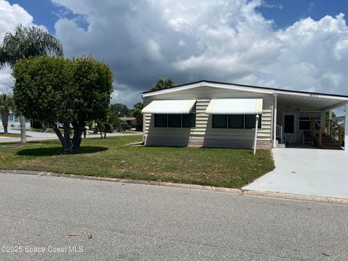 601 Periwinkle Cir, Barefoot Bay, FL, 32976-7676 | Card Image