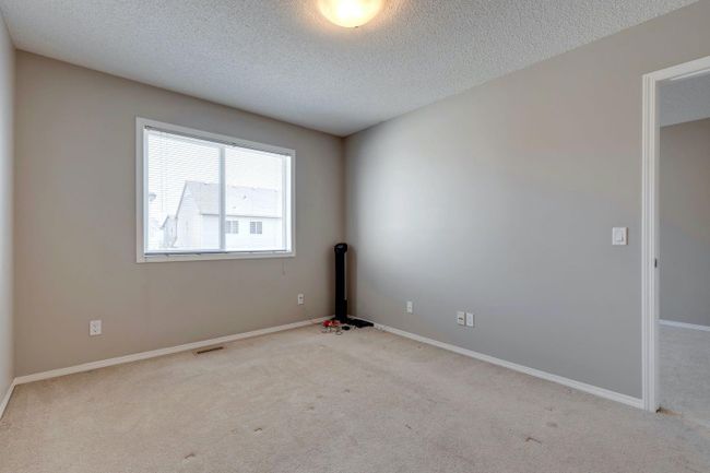 960 Windsong Dr Sw, Home with 3 bedrooms, 2 bathrooms and 4 parking in Airdrie AB | Image 26