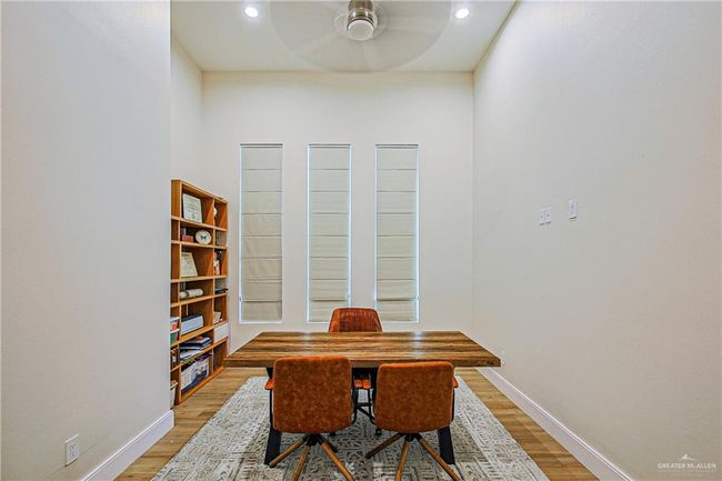 Office/Study featuring a ceiling fan, porcelain floors, and recessed lighting | Image 8