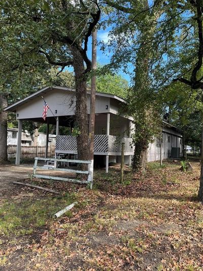 View of side of home featuring central AC | Image 2