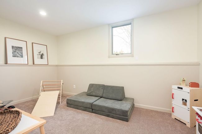 Lower level 4th bedroom, currently used as a playroom. (9-foot ceilings). | Image 39