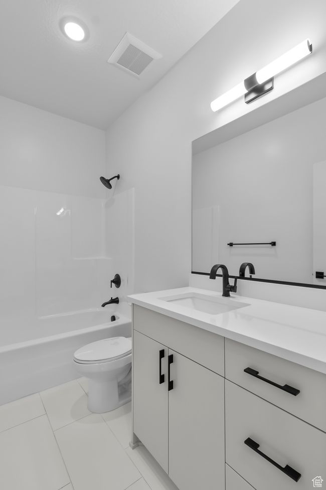 MAIN BATH W/ WHITE CABINETS...QUARTZ COUNTERTOPS...BLACK FAUCETS & HARDWARE! (PICTURE IS FROM A PREVIOUSLY BUILT HOME) | Image 9