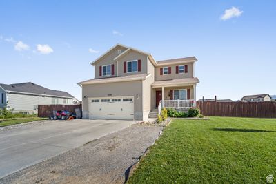 Front of property with a garage, a front lawn, and a porch | Image 3