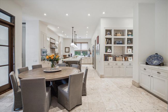 The breakfast room is open to the family room and the kitchen. | Image 8