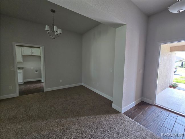 view of foyer to dining room | Image 6