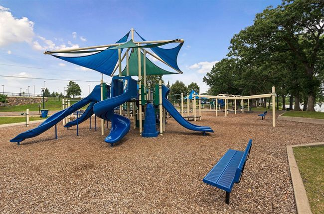 Parkers Lake offers playground, picnic shelters, swimming beach, ball fields and courts, tennis/pickleball, and paved trails | Image 21