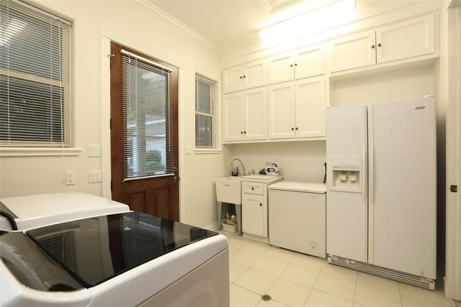 Another view of the large utility room. | Image 30