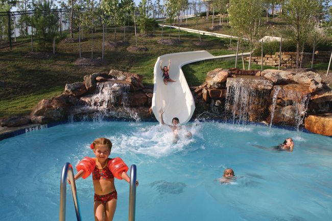 From swimming laps to sliding down our 140-foot water slide, soak up fun in the sun at our three pool complexes. | Image 35