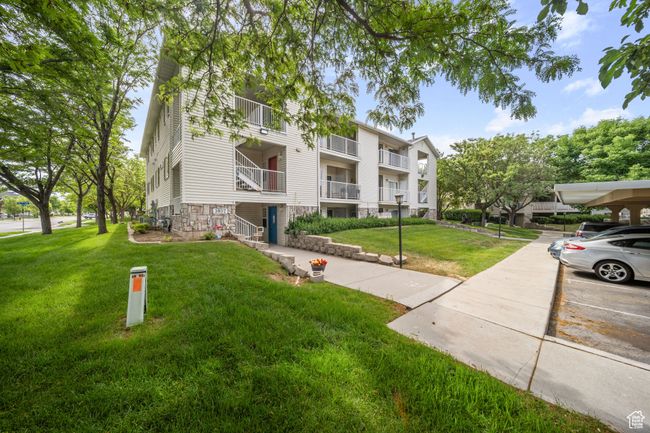 View of property featuring a parking lot | Image 12