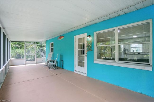 View of unfurnished sunroom | Image 15