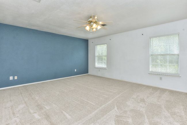 Enormous primary bedroom boasts and additional sitting/office space....literally a sanctuary! | Image 22