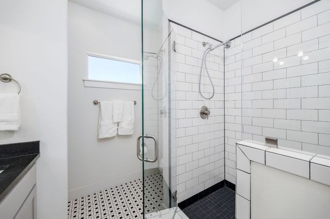 Spacious walk-in shower. | Image 34