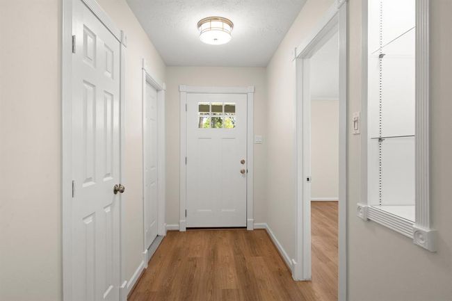 Hallway from Kitchen to front door and Garage | Image 10