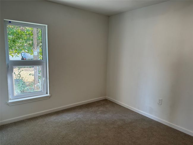 Carpeted empty room featuring baseboards and a healthy amount of sunlight | Image 20