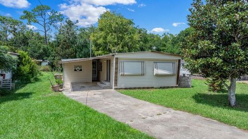 13337 Woodland Dr, ASTATULA, FL, 34705-9517 | Card Image