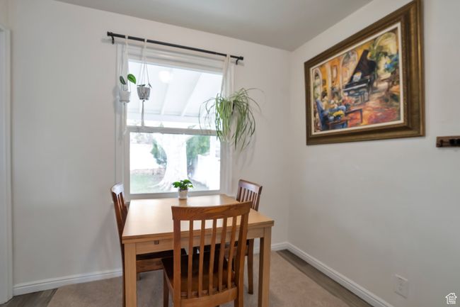 Dining area with baseboards | Image 5