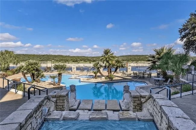 Community pool featuring a patio | Image 13