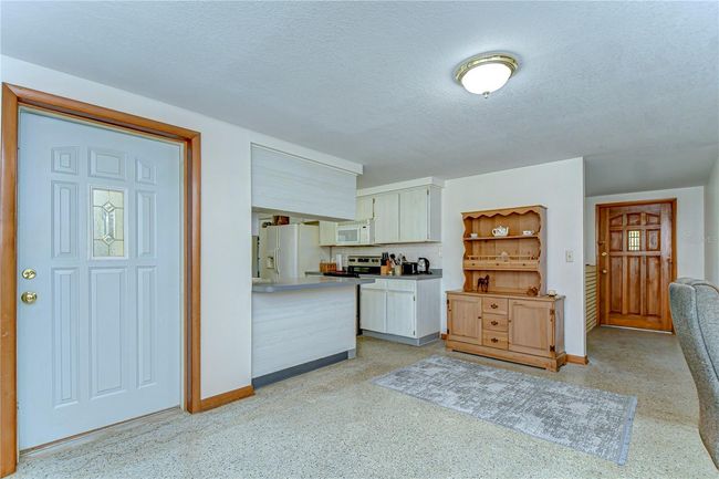Family room with door to back porch | Image 17